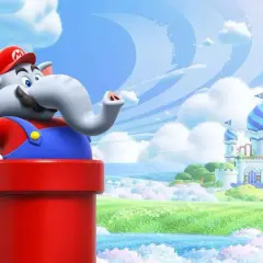 Słoń Mario z serii Super Mario wychyla się z czerwonej rury na tle bajkowej krainy z zamkiem.