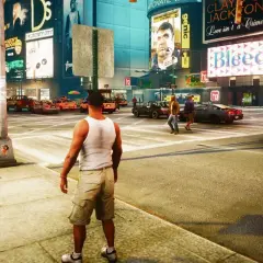 Liberty City w GTA 4 Remaster tętni życiem. Taksówki, ruch uliczny i gigantyczne billboardy tworzą niepowtarzalny klimat.