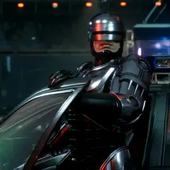 RoboCop w swoim ikonicznym pancerzu opiera się o radiowóz, gotowy do akcji w grze RoboCop: Rogue City.