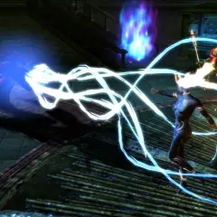 W grze Dungeon Siege 3 bohaterowie walczą z potworem, używając magicznych zaklęć i broni.