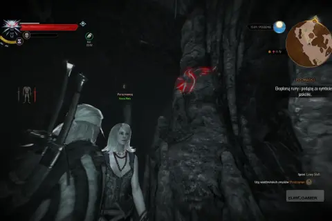 Geralt i Keira Metz w jaskini, szukają symbolu jaskółki. Misja "Po omacku" w Wiedźminie 3.