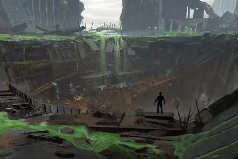 Postapokaliptyczny krajobraz z zieloną, radioaktywną mazią. Widok na zniszczone budynki i zapadlisko, jak w **Fallout 2 remake**.