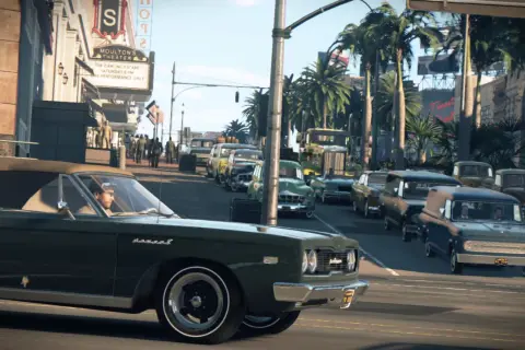 Uliczny ruch w stylu lat 60. z klasycznymi autami, idealny do gry Mafia 3. Wymagania sprzętowe tej gry pozwalają na taką grafikę.
