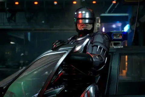 RoboCop w swoim ikonicznym pancerzu opiera się o radiowóz, gotowy do akcji w grze RoboCop: Rogue City.