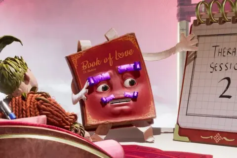 Książka "Book of Love" Dr. Hakima prowadzi terapię. Na kalendarzu widnieje "Therapy Session 2".
