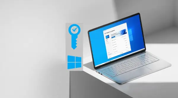Grafika z kluczem i logo Windows, obok laptopa z ekranem pokazującym "PC health at a glance". Dowiedz się, jak sprawdzić klucz Windows 10.
