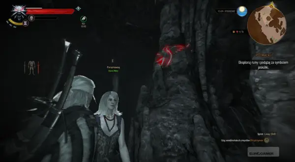 Geralt i Keira Metz w jaskini, szukają symbolu jaskółki. Misja "Po omacku" w Wiedźminie 3.