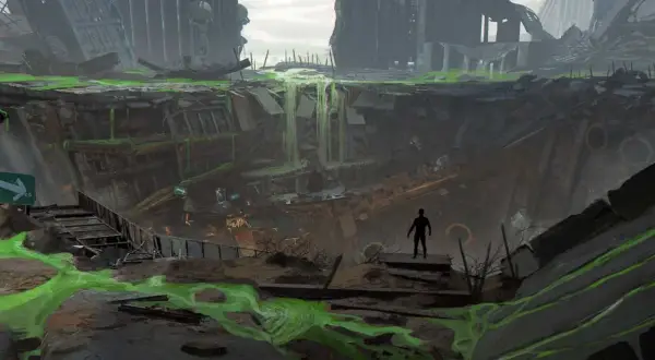 Postapokaliptyczny krajobraz z zieloną, radioaktywną mazią. Widok na zniszczone budynki i zapadlisko, jak w **Fallout 2 remake**.