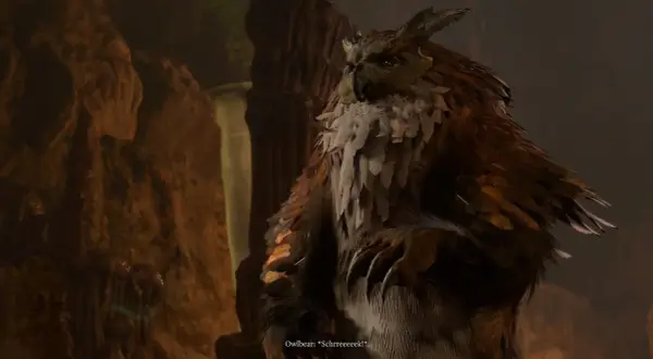 Potężny sowodźwiedź z Baldur's Gate 3, z piórami i pazurami, wydaje przerażający okrzyk w jaskini.