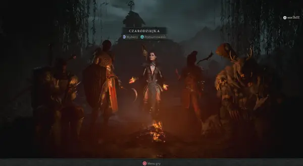 Czarnoksiężniczka w Diablo 4 najlepsza klasa, otoczona innymi postaciami przy ognisku.