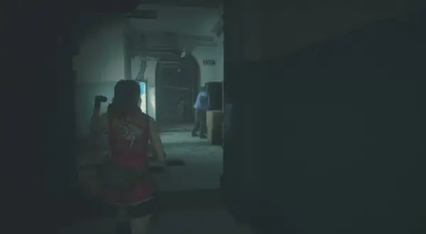 Claire Redfield w czerwonej kamizelce, szukająca wyjścia. Ten **resident evil 6 poradnik** pomoże Ci przetrwać.