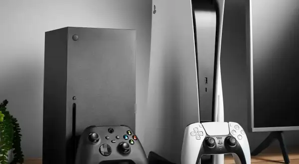 Czarny Xbox Series X i biały PlayStation 5 stoją obok siebie. Którą konsolę wybierasz?