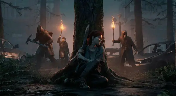 Ellie ukrywa się za drzewem, podczas gdy inni z pochodniami i kilofem zbliżają się w mrocznym lesie. Czy to zapowiedź The Last of Us sezon 3?