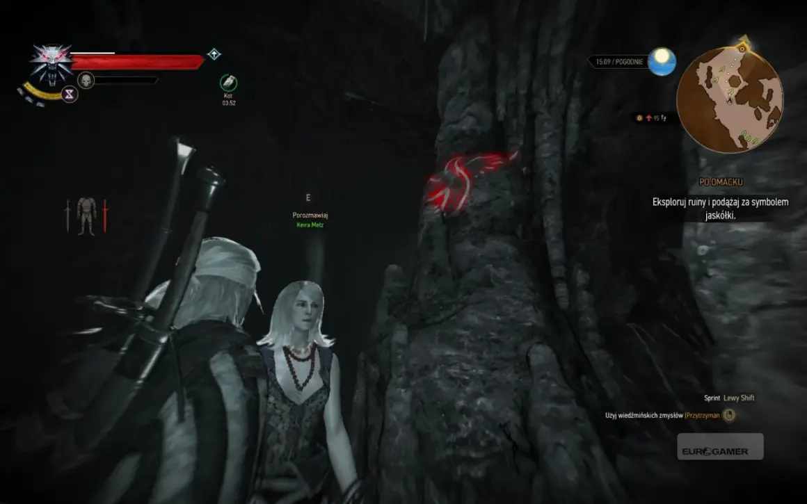 Geralt i Keira Metz w jaskini, szukają symbolu jaskółki. Misja "Po omacku" w Wiedźminie 3.