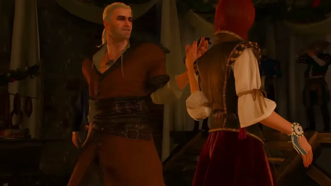 Geralt z Rivii, w stroju z Wiedźmin 3, tańczy z rudowłosą kobietą. Hulaj dusza!