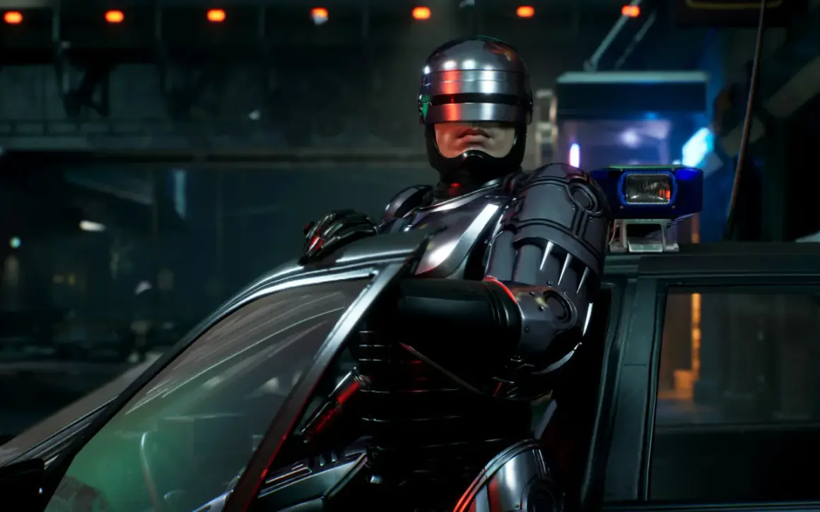RoboCop w swoim ikonicznym pancerzu opiera się o radiowóz, gotowy do akcji w grze RoboCop: Rogue City.