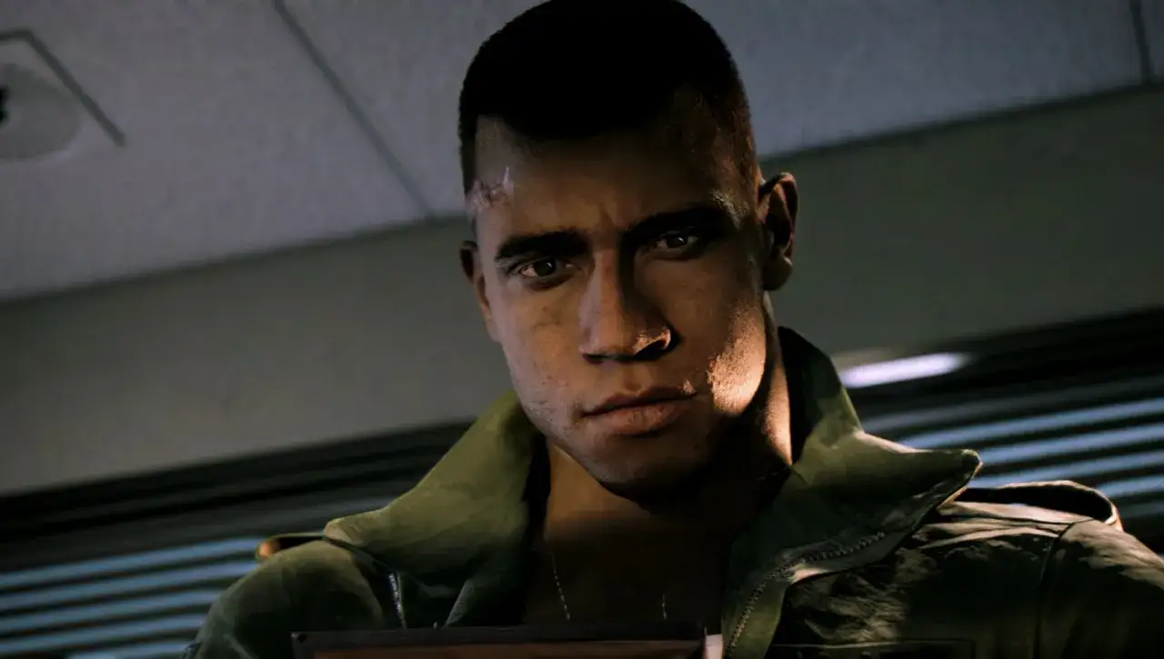 Lincoln Clay z Mafia 3, z blizną na czole, w zielonej kurtce. Sprawdź, czy Twój sprzęt spełnia wymagania Mafia 3.