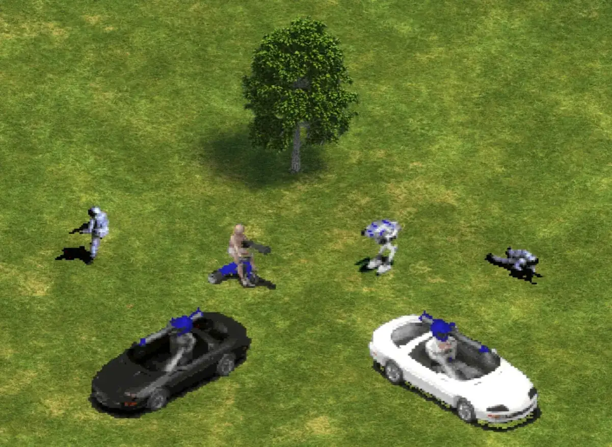Scena z gry Age of Empires 2 kody: żołnierze, roboty i samochody na trawiastym polu.