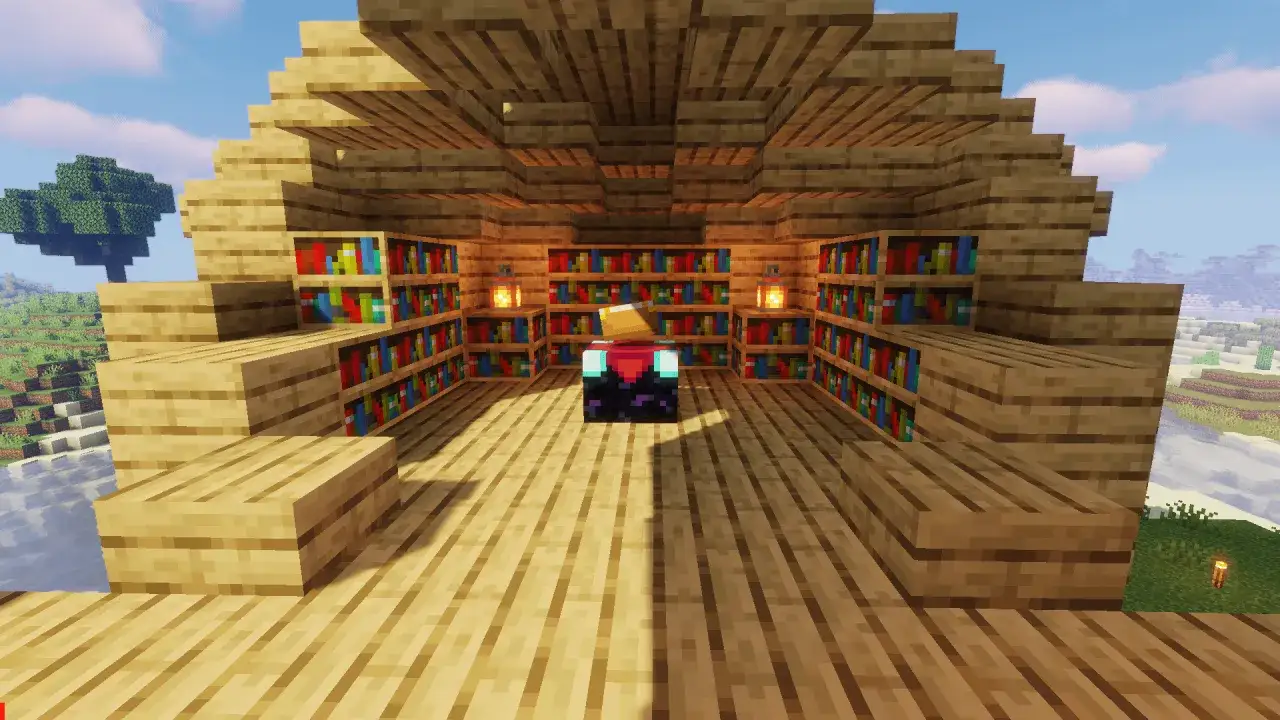 Wnętrze drewnianej chatki w Minecraft z półkami pełnymi książek. Centralnie umieszczony stół do zaklęć. Oto jak zrobic biblioteczke w mc.