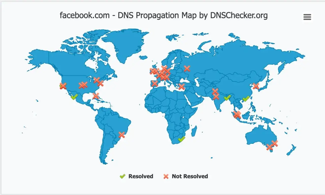 Mapa propagacji DNS dla facebook.com pokazuje globalną awarię Facebooka z wieloma nierozwiązanymi serwerami oznaczonymi czerwonymi krzyżykami.