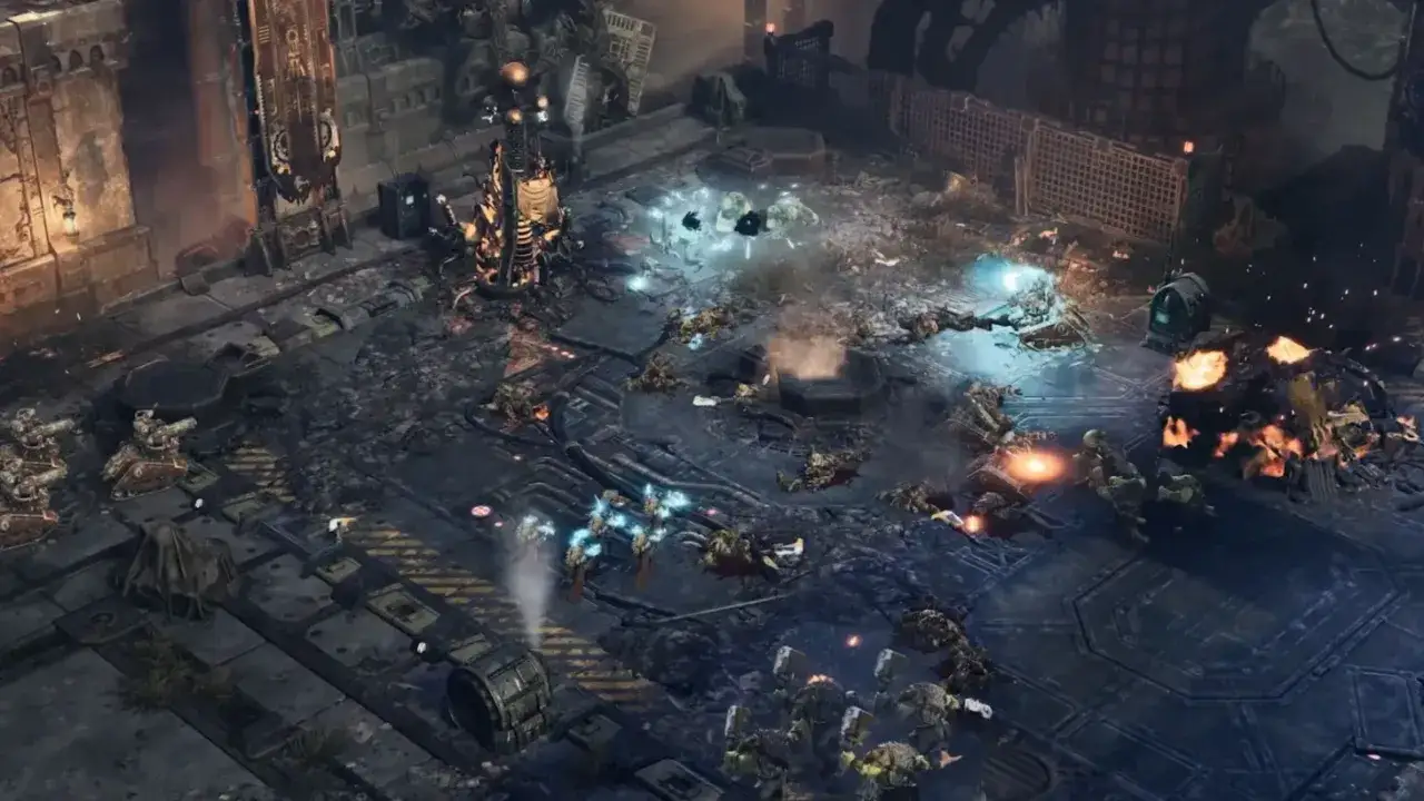 Bitwa w świecie Dawn of War 4. Żołnierze walczą wśród zniszczeń, eksplozji i poległych towarzyszy.