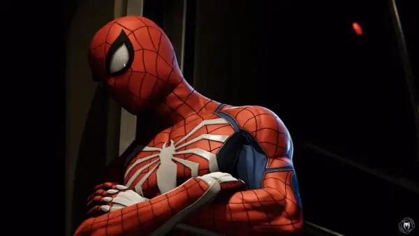 Spider-Man w swoim kultowym stroju, zamyślony. Może właśnie zdobył kolejne trofea w grze Spider-Man 2.