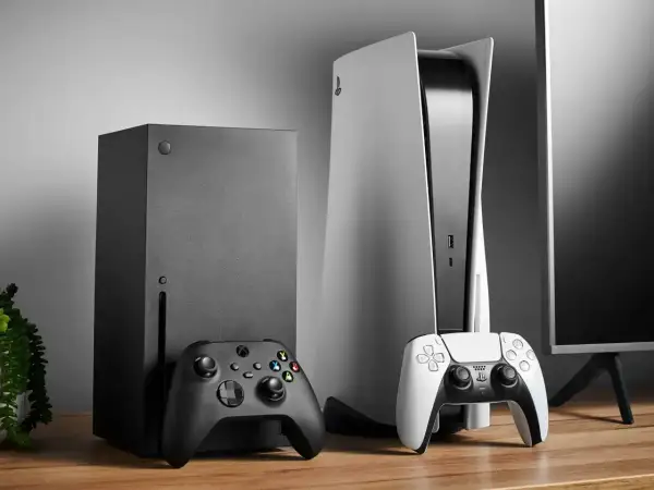 Czarny Xbox Series X i biały PlayStation 5 stoją obok siebie. Którą konsolę wybierasz?
