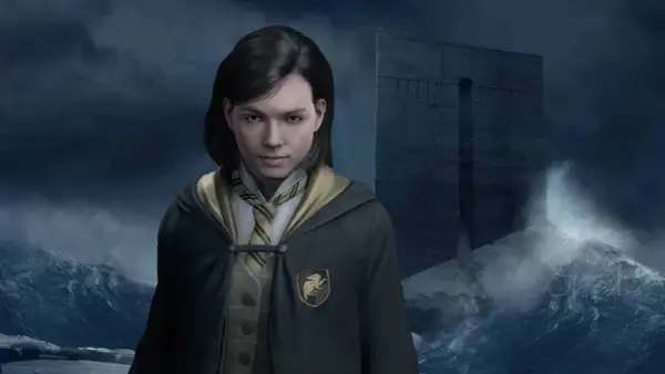 Młoda czarodziejka z Hogwart Legacy Hufflepuff stoi na tle burzliwego morza i tajemniczej budowli.