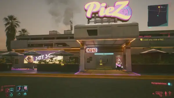 Cyberpunkowa pizzeria PieZ z neonowym znakiem. Zbliża się misja "Znak Jonasza", by usiąść przy stole.